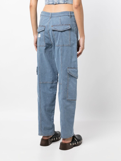 Shop Ganni Stripe-pattern Cargo Jeans In 蓝色