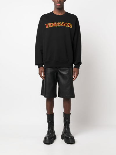 Shop Versace Logo-embroidered Cotton Sweatshirt In Black