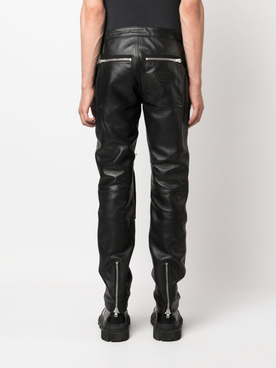 Shop Moschino Zip-detail Fitted Leather Trousers In Black