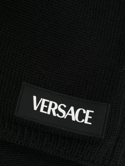 Shop Versace Logo-appliqué Knitted Scarf In Black