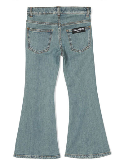 Shop Balmain Low-rise Flared Jeans In Blue