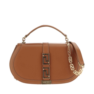 Shop Versace Logo Plaque Shoulder Bag In Brown