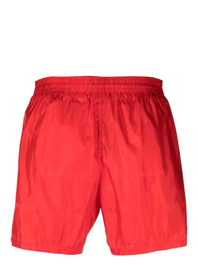 Shop Balmain Logo-print Swim Shorts In Red