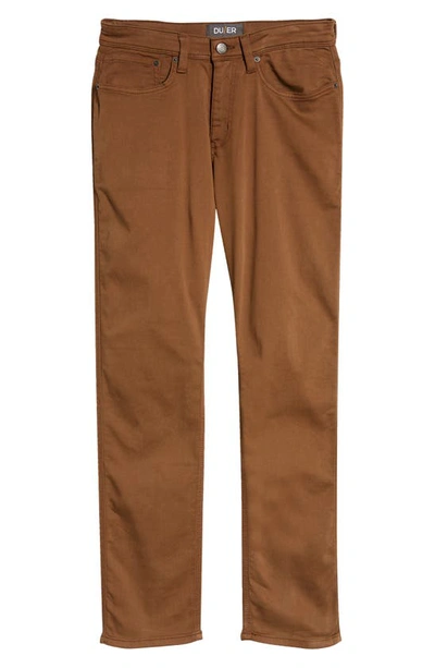 Shop Duer No Sweat Relaxed Tapered Performance Pants In Golden