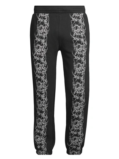 Shop Givenchy Cotton Printed Pants In Black