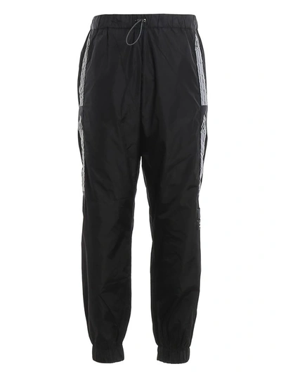 Shop Marcelo Burlon County Of Milan Jogging Style Pants In Black
