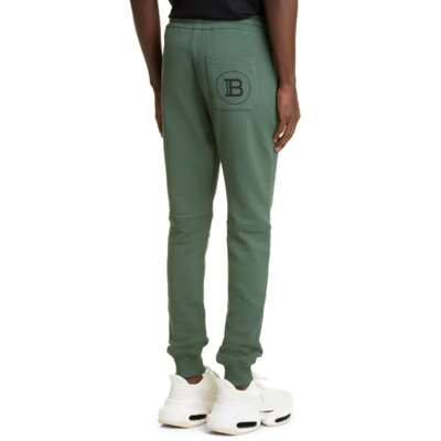 Shop Balmain Cotton Logo Sweatpants In Green