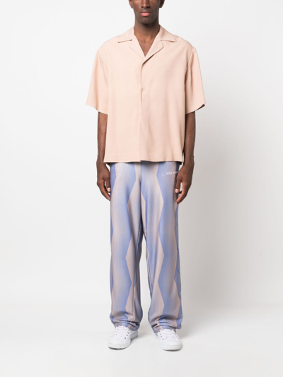 Shop Acne Studios Graphic-print Straight Trousers In Purple
