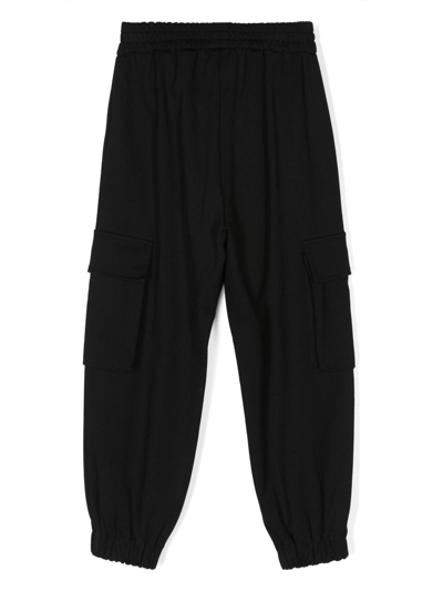 Shop Balmain Cargo Track Pants In Black