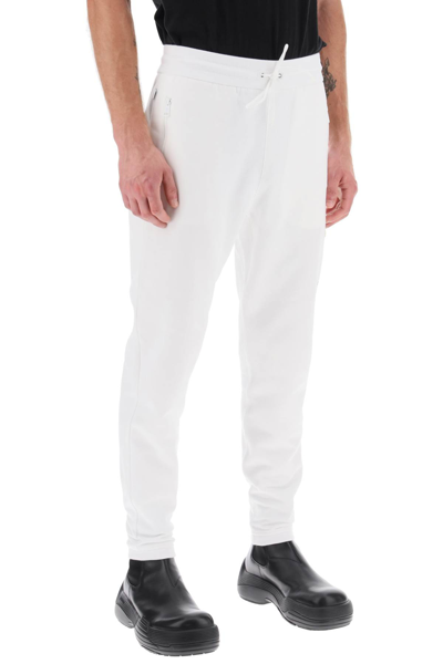 Shop Moncler Genius Tapered Cotton Sweatpants In White (white)