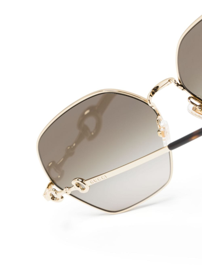 Shop Gucci Horsebit Sunglasses In Gold