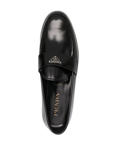 Shop Prada Logo-plaque Leather Loafers In Black