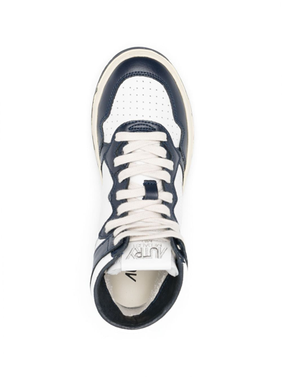 Shop Autry High-top Lace-up Sneakers In White