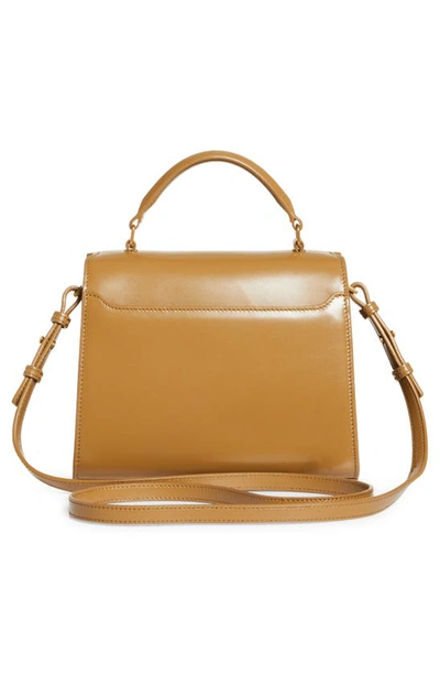 Shop Saint Laurent Mini Cassandra Leather Top Handle Bag In Cappuccino