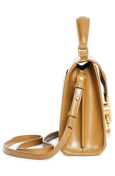 Shop Saint Laurent Mini Cassandra Leather Top Handle Bag In Cappuccino