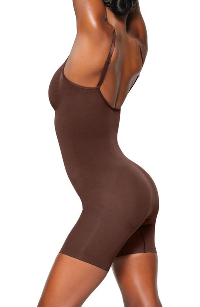 Shop Skims Seamless Sculpt Mid Thigh Bodysuit In Cocoa