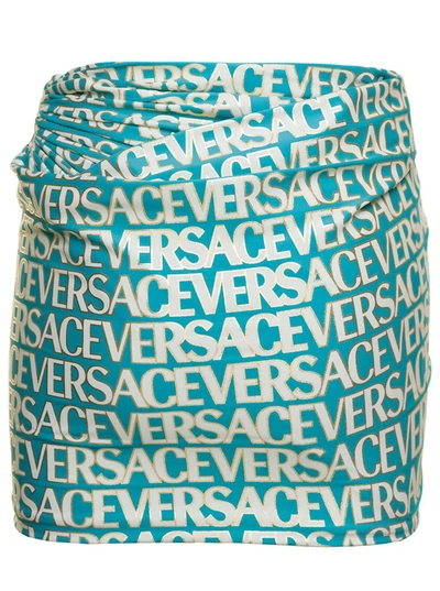 Shop Versace Light Blue Draped Mini Skirt With All-over Logo Lettering And Medua Buckle In Stretch Polyamide Woma