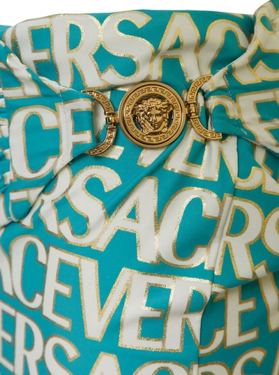 Shop Versace Light Blue Draped Mini Skirt With All-over Logo Lettering And Medua Buckle In Stretch Polyamide Woma