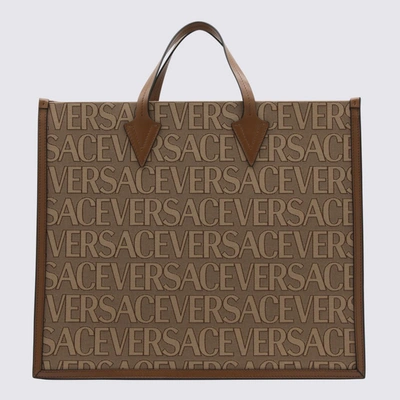 Shop Versace Brown Canvas And Leather Allover Tote Bag In Beige