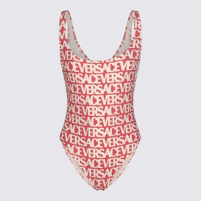 Shop Versace Pink And White Swimsuit