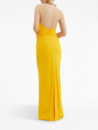 Shop Rebecca Vallance Phoenix Twist-detail Halterneck Gown In Yellow