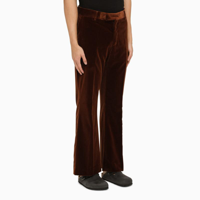 Shop Palm Angels Velvet Flared Trousers In Brown