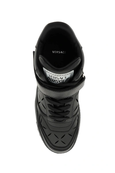 Shop Versace 'odissea' Sneakers With  Cut Outs