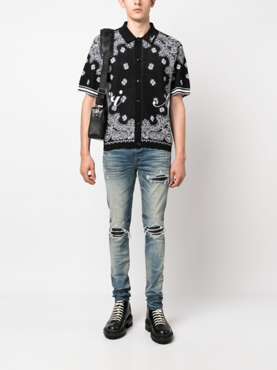 Amiri Distressed Skinny Jeans In Blau