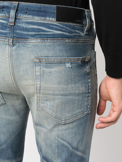 Amiri Distressed Skinny Jeans In Blau
