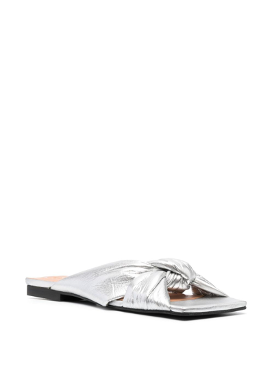 Shop Ganni Metallic-finish Knot-detail Flats In Silber