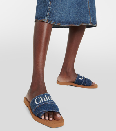 Shop Chloé Woody Denim Slides In Blue