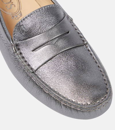 Shop Tod's Metallic Leather Moccasins In Gold
