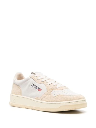 Autry Low Top Sneakers In Calf Leather In Neutral
