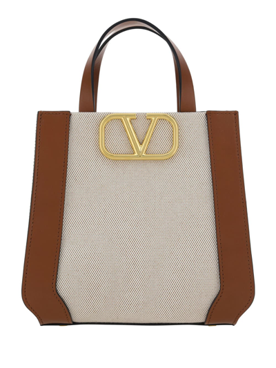 Shop Valentino Garavani Vlogo Small Tote Bag In Bicolor Beige/selleria