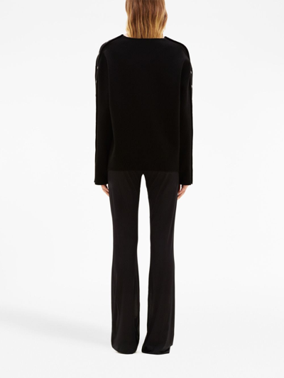 Shop Courrèges Logo-embroidered Flared Trousers In Black