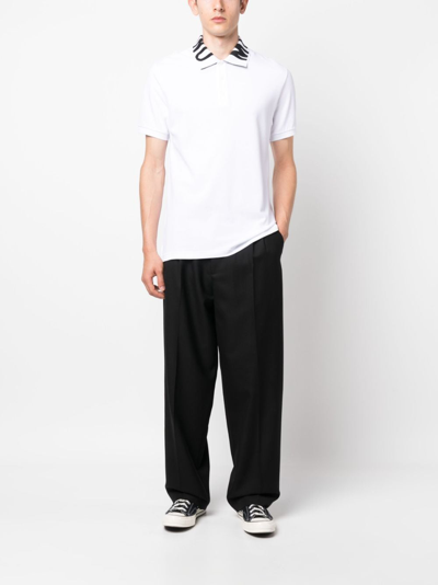 Shop Moschino Logo-print Cotton Polo Shirt In Weiss