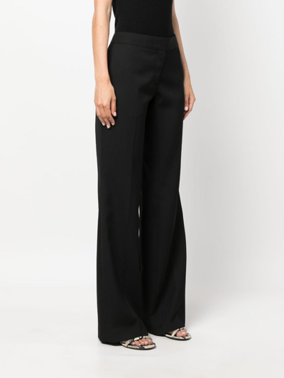 Jil Sander Mid-rise Flared Tailored Trousers In Schwarz
