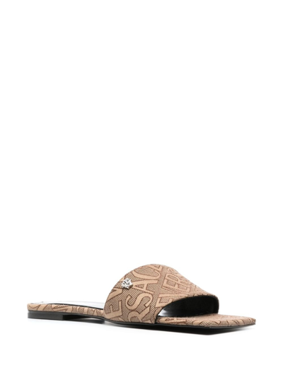 Shop Versace Allover Slides In Brown