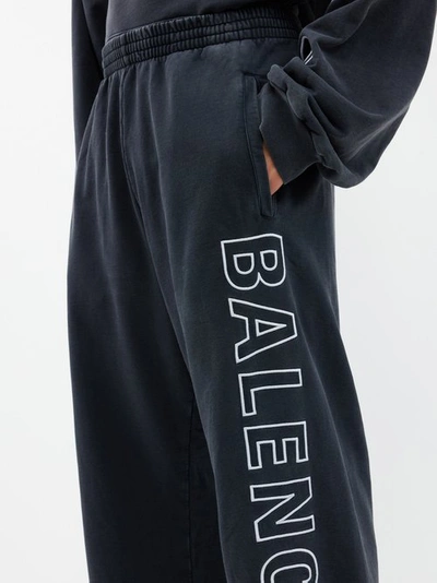 Shop Balenciaga Logo-print Baggy Cotton-jersey Track Pants In Black White