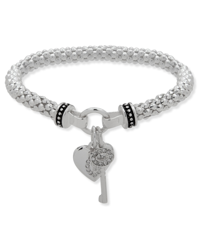 Shop Nine West Boxed Heart And Key Stretch Bracelet In Silver