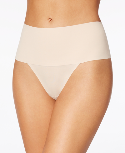 Shop Spanx Women's Undie-tectable Thong Sp0115 In Tan/beige