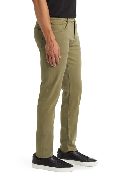 Shop Seven 7 For All Mankind Slimmy Luxe Performance Plus Slim Fit Pants In Willow Green