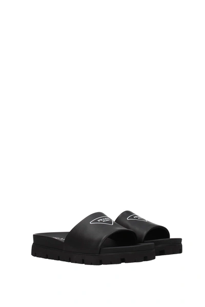 Shop Prada Slippers And Clogs Leather Black