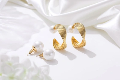 Shop Classicharms Golden Wave Hoop Earrings