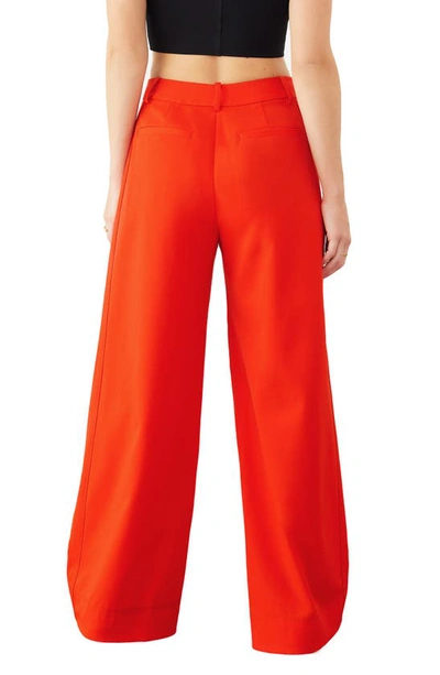 Shop Gstq Luxe Wide Leg Trousers In Neon Rouge