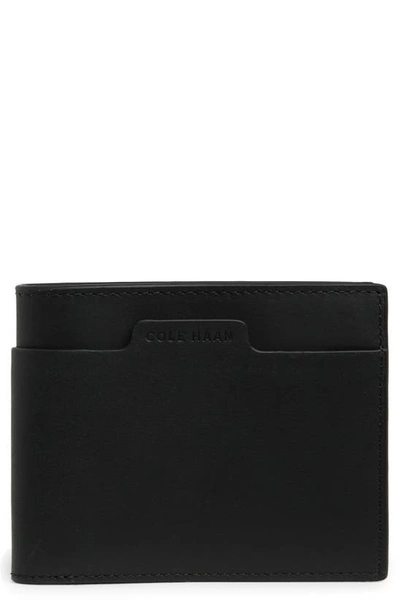 Shop Cole Haan Diamond Slim Bifold Wallet In Black