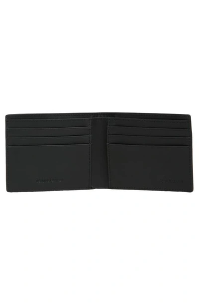 Shop Cole Haan Diamond Slim Bifold Wallet In Black