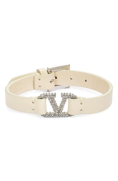 Shop Valentino Vlogo Crystal Leather Bracelet In Light Ivory/palladio-crystal