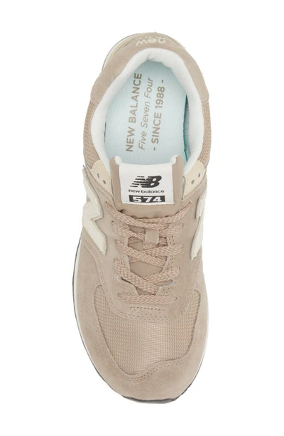 Shop New Balance 574 Sneaker In Brown/ Off White