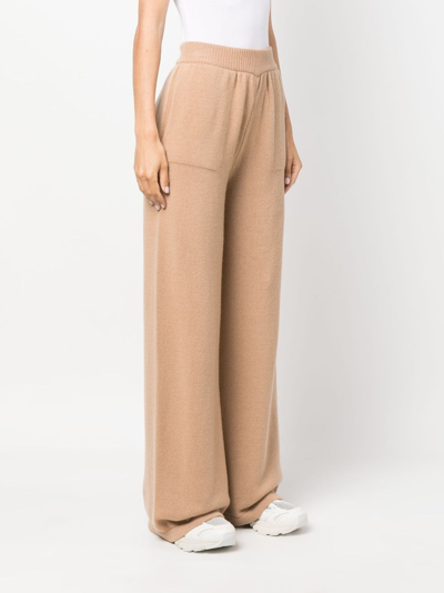 Shop Msgm Embroidered-logo Knit Trousers In Brown